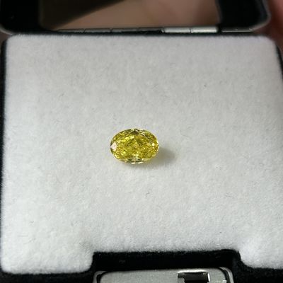 1.18ct cắt hình bầu dục HPHT phòng thí nghiệm kim cương Fancy Vivid Yellow VVS2 2VG N IGI chứng nhận